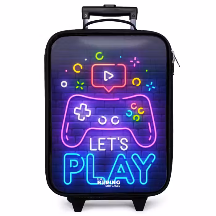 Kinderkoffer - Neon-Controller vor einer Backsteinmauer