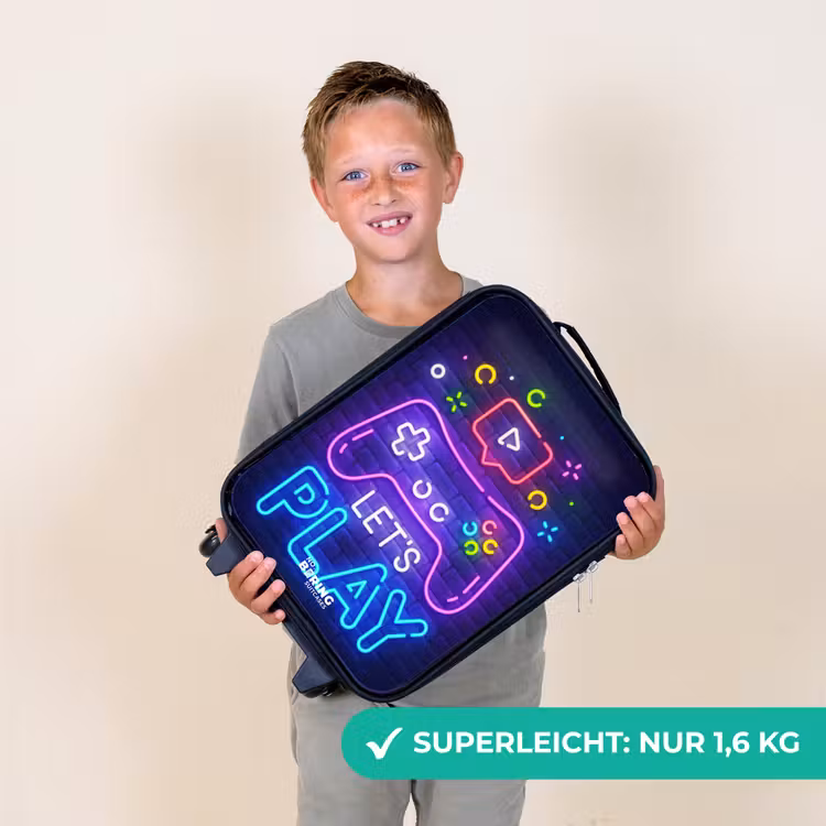 Kinderkoffer - Neon-Controller vor einer Backsteinmauer — 2