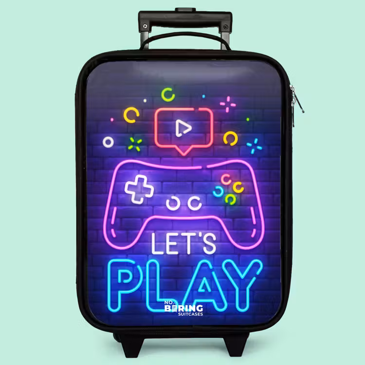 Kinderkoffer - Neon-Controller vor einer Backsteinmauer — 3
