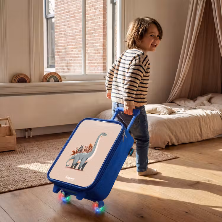 Kinderkoffer Blau - Blauer Dinosaurier auf einem beigen Hintergrund — 2