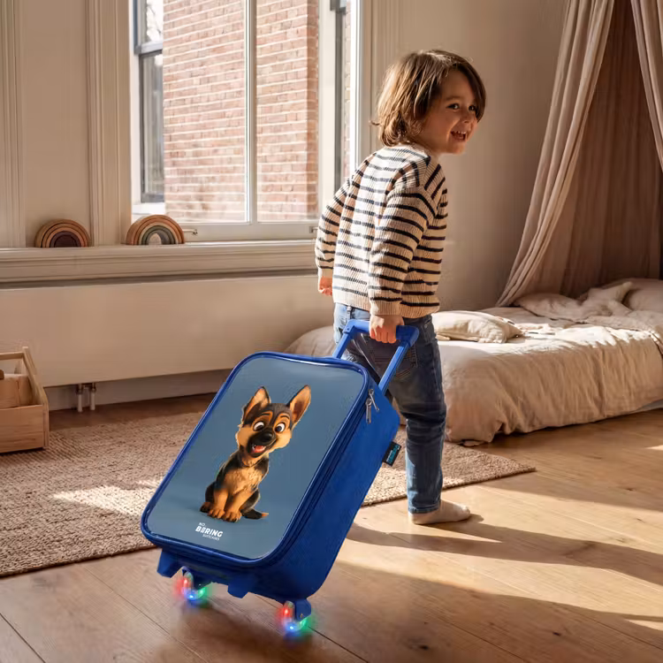 Kinderkoffer Blau - Porträt eines Schäferhundwelpen — 2