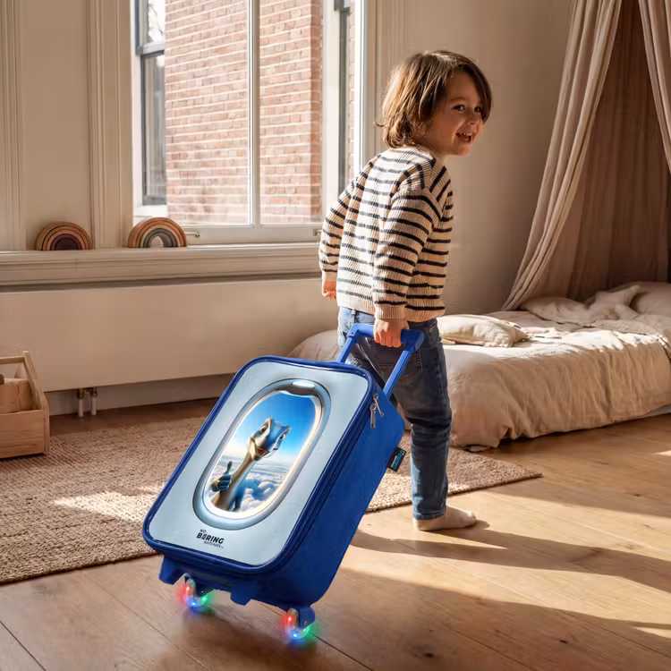 Kinderkoffer Blau - Dino aus einem Flugzeugfenster — 2